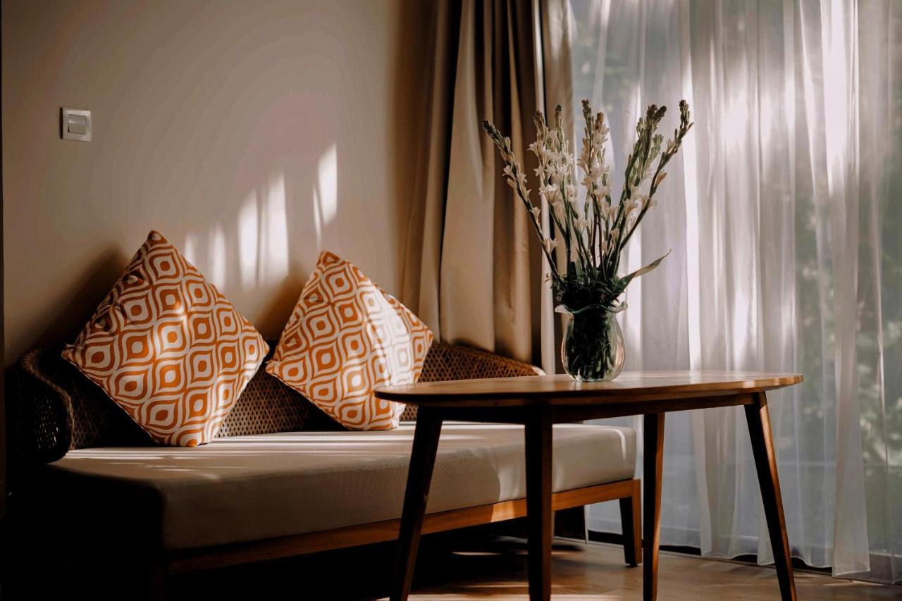 The Sebali Resort Убуд Екстериор снимка A table and a sofa