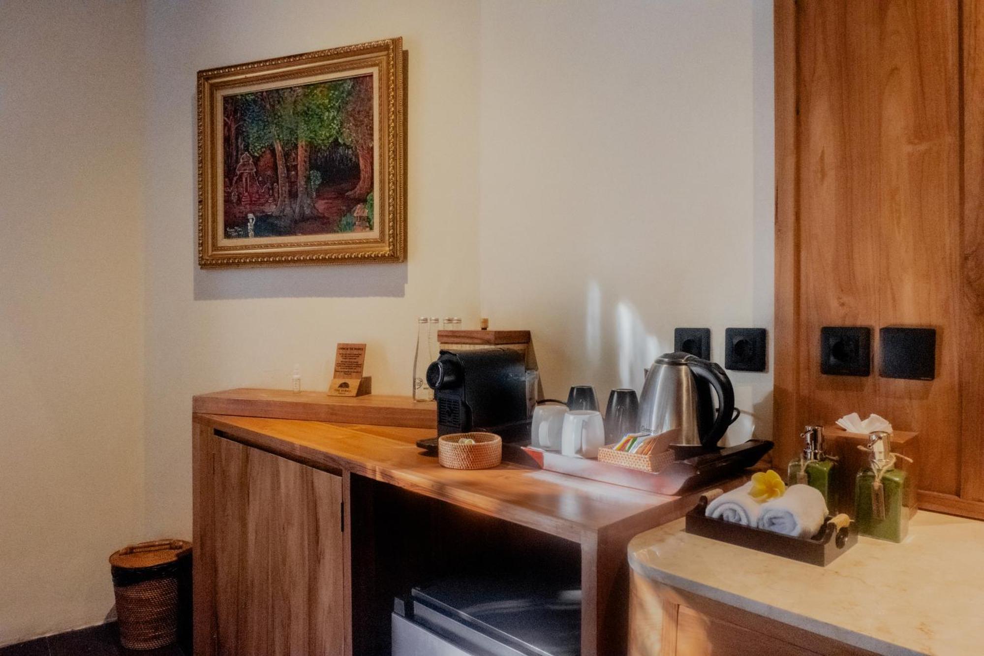 The Sebali Resort Убуд Екстериор снимка A Nespresso machine in a hotel room